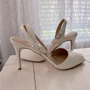 Via Spiga Size 7. 3.5” heel. Delicate off white sandals with ankle strap.